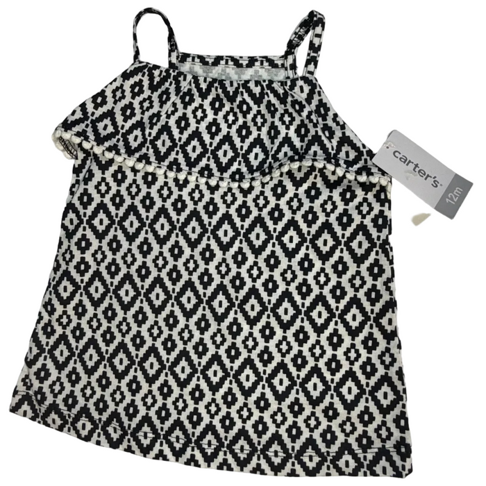 A Carter's brand black and white geometric patterned camisole top for kids, laid flat on a white background with its retail tag still attached.