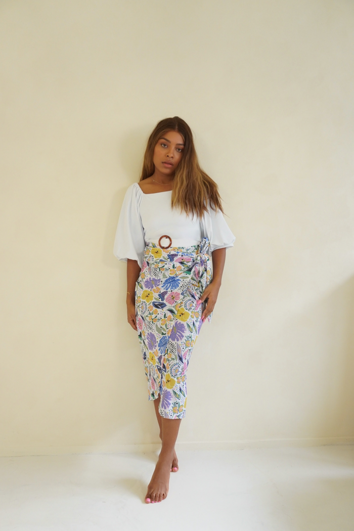 Detailed view of the Ana Swim Skirt in floral print, showcasing the intricate pattern and modest design for a stylish swimwear option.