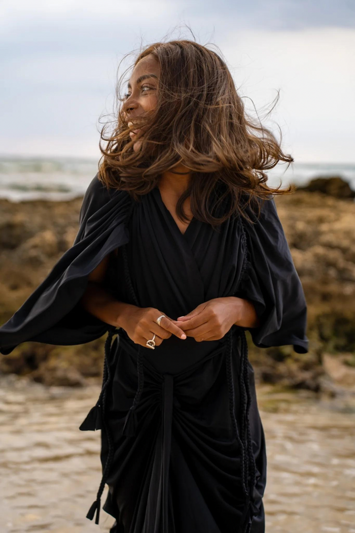 Back view of the Camila Swim Set in black, featuring the Lia modest swim skirt, designed for comfortable and stylish coverage.