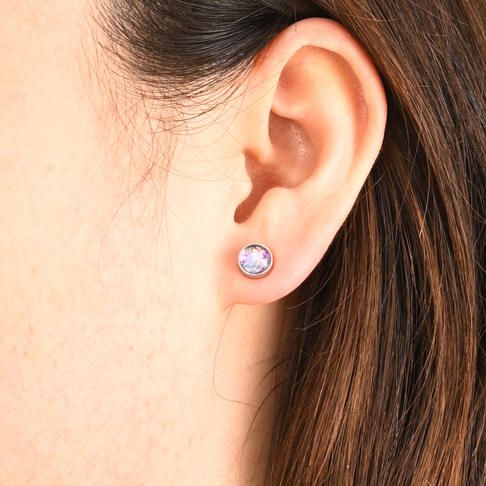 Pair of round lavender opal stud earrings with a white gold finish, shown close-up | Jewelry that Fights Against Human Trafficking