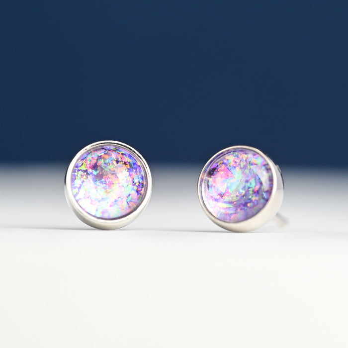 Pair of round lavender opal stud earrings with a white gold finish, shown close-up | Jewelry that Fights Against Human Trafficking