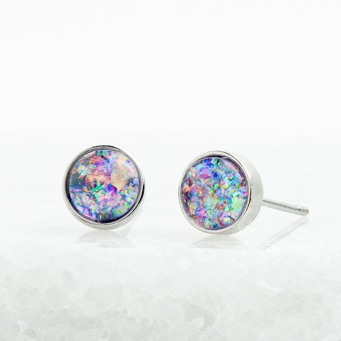 Pair of round lavender opal stud earrings with a white gold finish, shown close-up | Jewelry that Fights Against Human Trafficking
