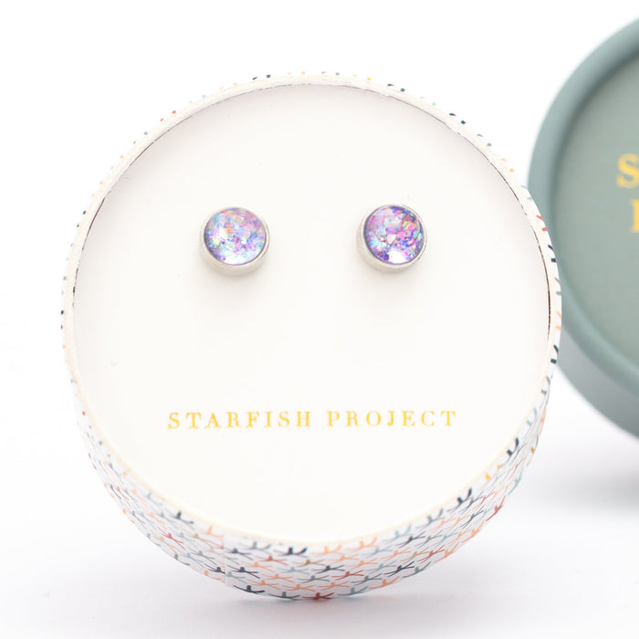 Pair of round lavender opal stud earrings with a white gold finish, shown close-up | Jewelry that Fights Against Human Trafficking