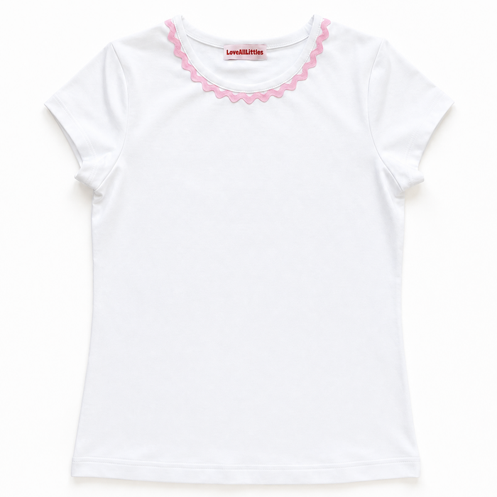 White t-shirt with pink trim on a white background