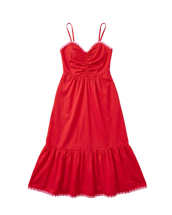 Red dress with pink trim on a white background