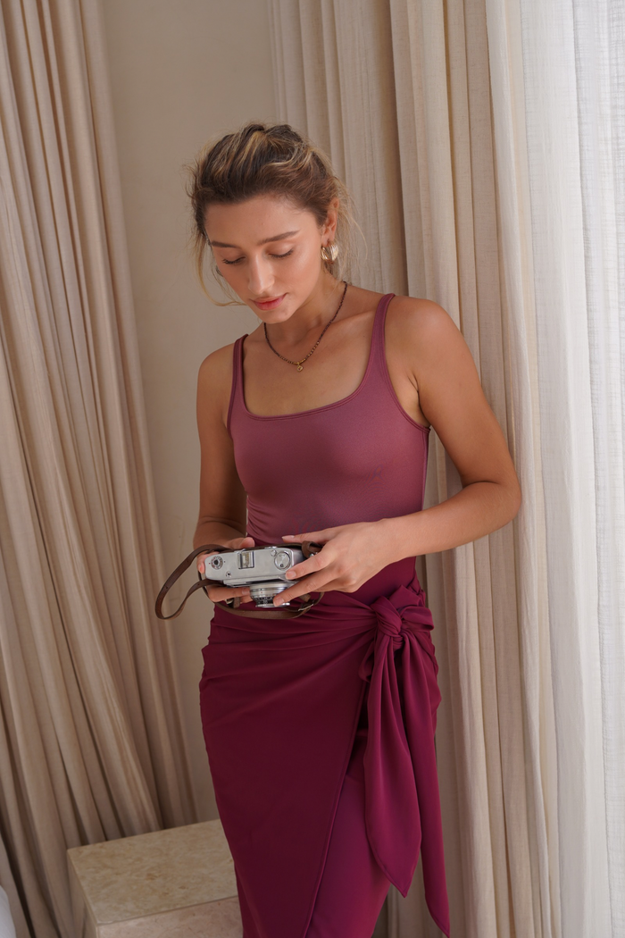 Full-coverage modest swimwear with adjustable straps and lightweight wrap-style skirt.