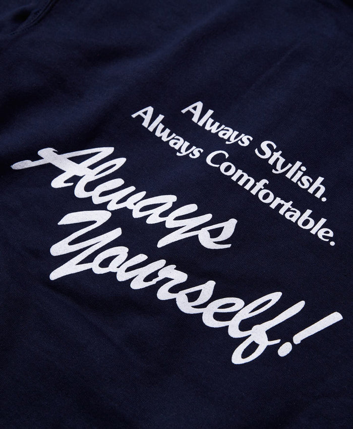 Close-up of the Andie Always Full Zip Hoodie Sweatshirt in Navy, showcasing the white printed motto: 'Always Stylish. Always Comfortable. Always Yourself!
