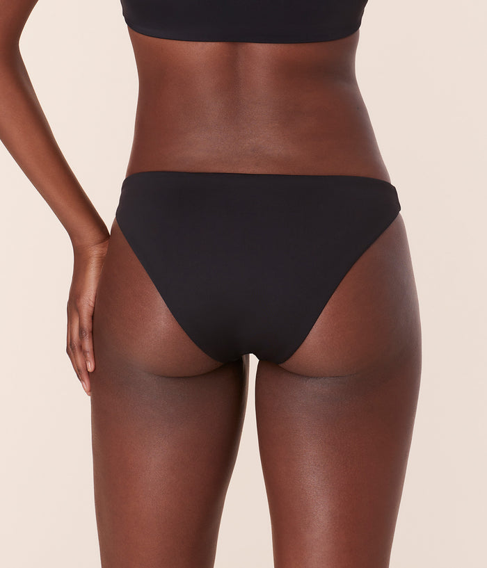 Back view of Andie Swim Cheeky Bottom in black, showcasing cheeky seat coverage and high leg cut for a flattering fit.