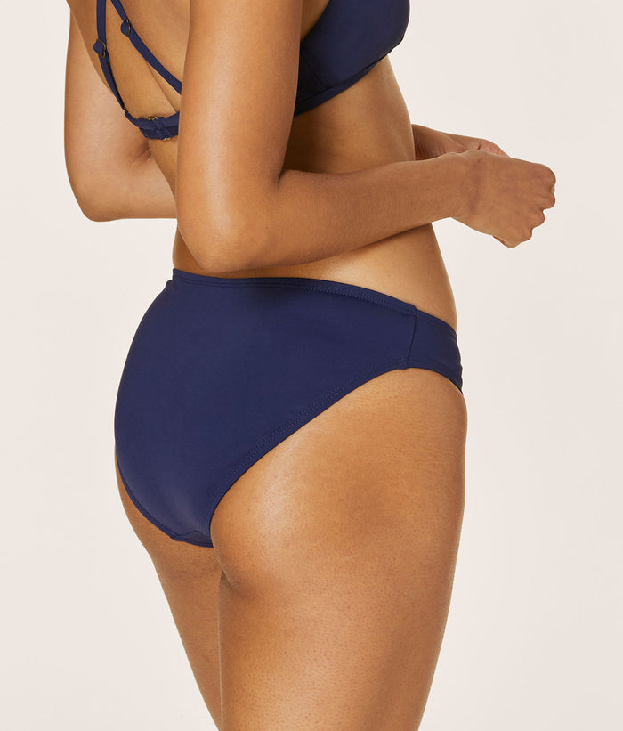 Andie Swim Bikini Bottom in Navy Eco Nylon with medium seat coverage and classic low rise design for versatile style.