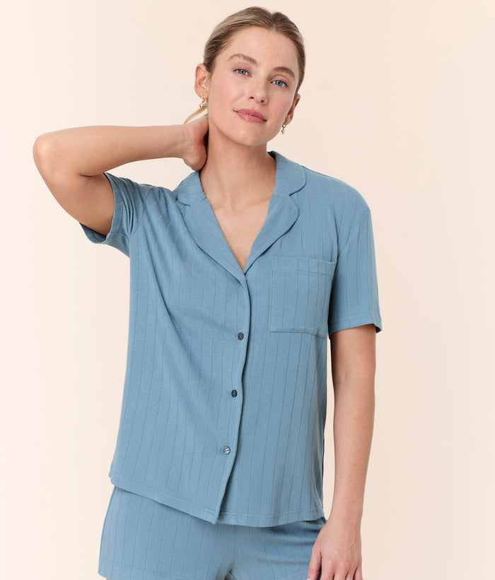 Front view of Andie Swim Infinity Blue Short Sleeve Button Up, versatile sleepwear with a button-down front and relaxed fit.