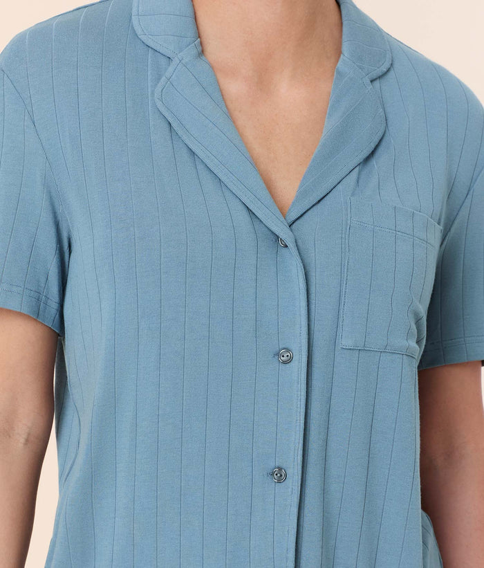 Andie Swim Short Sleeve Button Up in Infinity Blue, wide rib fabric with a relaxed fit and unlined design.
